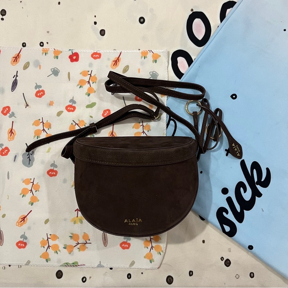 ALAIA Brown Suede Crescent Crossbody Bag with Gold Logo